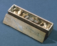 Wax shabti and wooden coffin.jpg